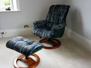 swivel reclining chair and footstool recovered in new fabric