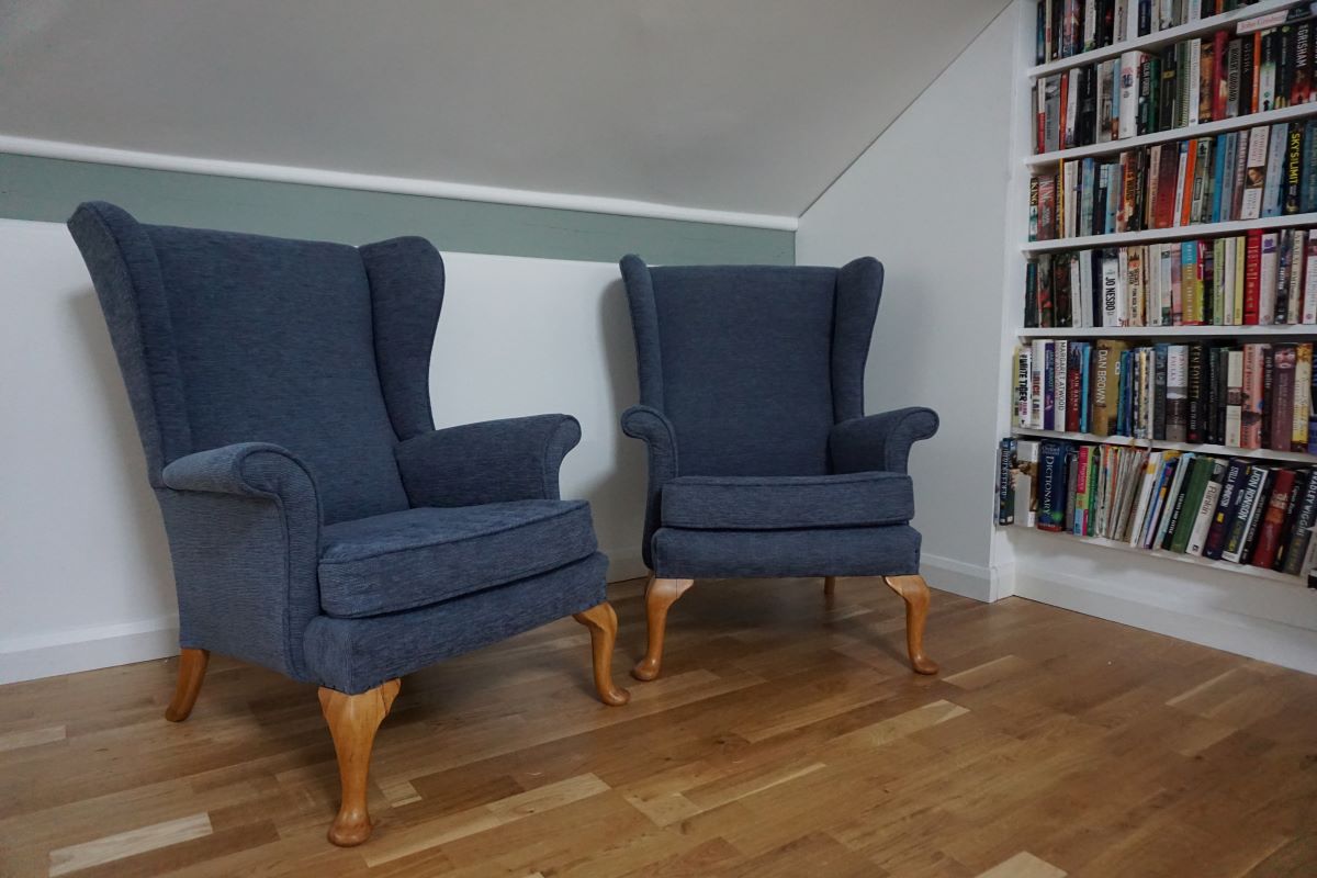 reupholstered parker knoll armchairs