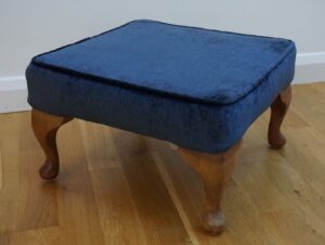 traditionally upholstered footstool